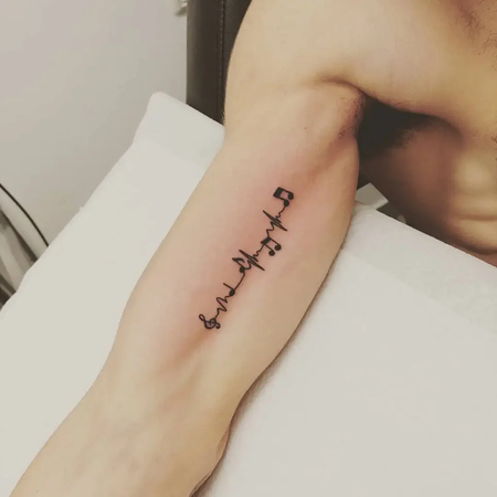 tattoo heartbeat with name