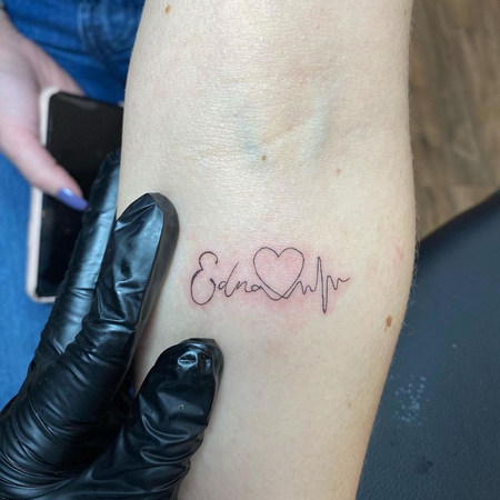 tattoo name with heartbeat