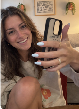 woman holding smartphone selfie