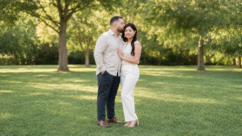 gentle forehead kiss during an outdoor photoshoot