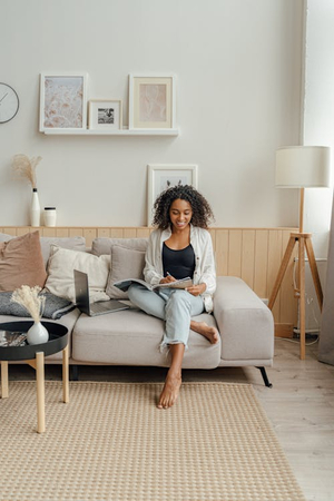 a girl with arm of the couch