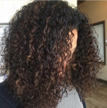 a girl with digital perm