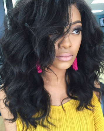 a girl with root perm