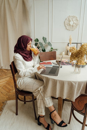 a girl with seated with legs crossed style