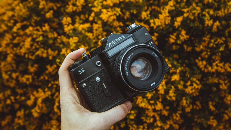 a man choosing his camera insurance provider