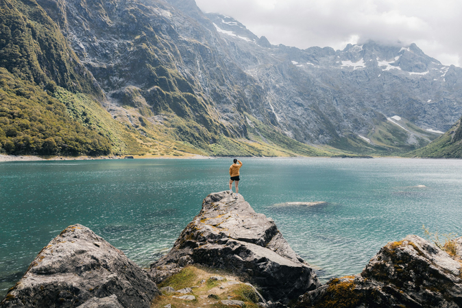 a woman watching the beautiful landscape