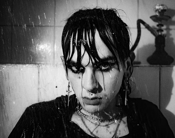 photo of a boy with Goth makeup