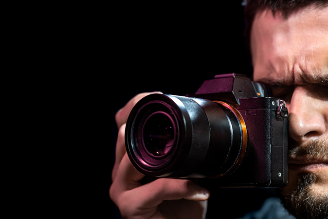 men photography of mid-range DSLR