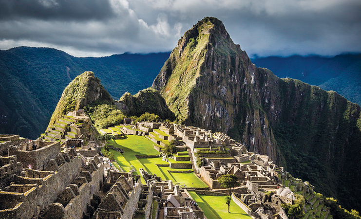 sunrise and ruins of machu picchu