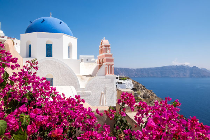 white buildings and blue domes of santorini