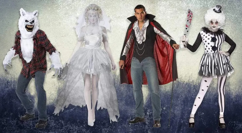 Four friends dressed in classic horror monster costumes including ghost and vampire