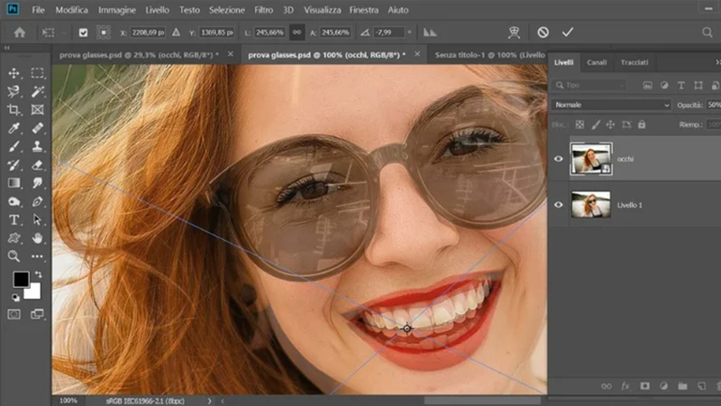 lowering layer opacity and aligning the eyes with free transform