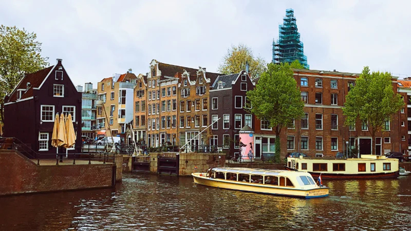 canals in amsterdam during early spring