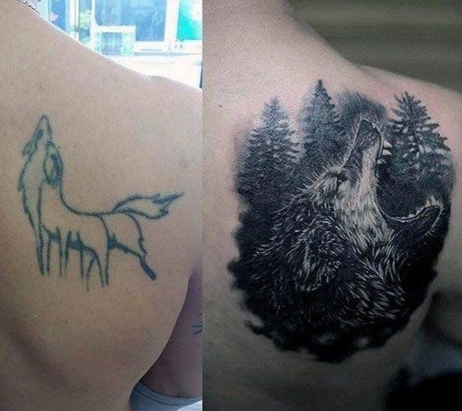 tatuagem de cobertura no antebraço com lobo uivando
