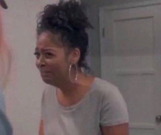 holding in laugh meme