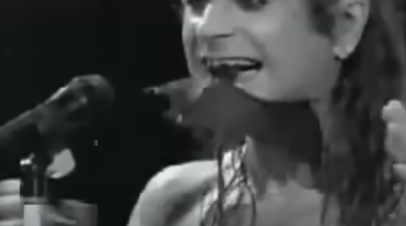 Ozzy Osbourne biting off the head of a bat on stage
