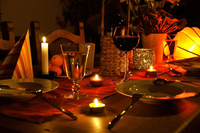 romantic candlelight dinner at home or restaurant