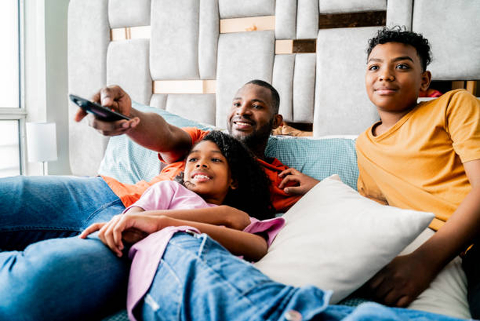 Family watching fathers day video